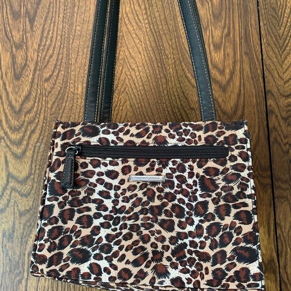 Small purse leopard print zipper pocket on the front wallet pocket on the back. - Picture 2 of 2